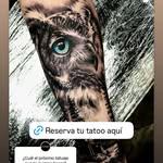 Tatuaje de búho realista en el brazo